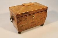 A George III yew veneered sarcophagus shaped tea caddy