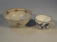 A Newhall slop bowl and a Meissen blue and white tea cup.