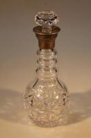 A three collar glass decanter