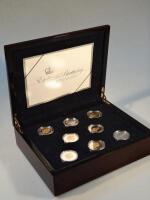A commemorative silver proof coin collection celebrating the 80th Birthday of Queen Elizabeth II (17