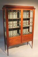 An Edwardian mahogany display cabinet