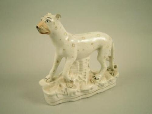 A 19thC Staffordshire figure of a leopard