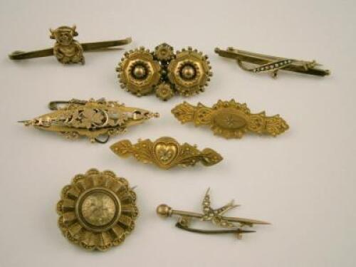 Eight brooches