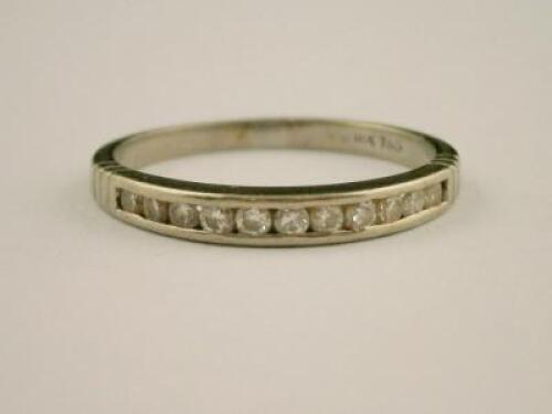 A half hoop eternity ring