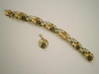 A ladies continental bracelet with matching pendant