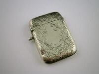 A silver vesta case