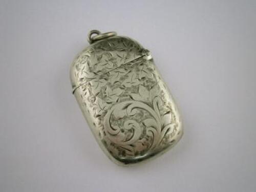 A silver vesta case