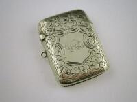 A silver vesta case