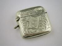 A silver vesta case