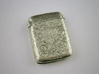 A silver vesta case