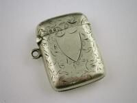 A silver vesta case