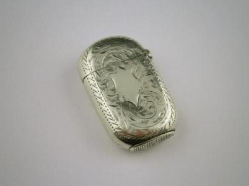 A silver vesta case