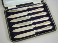 A set of six silver mounted dessert knives