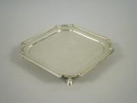 A small canted rectangular silver waiter
