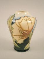 A small Moorcroft vase