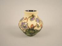 A small Moorcroft vase