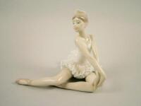 A Lladro figure of a seated girl