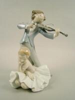 A Lladro figure group