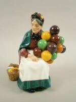 A Royal Doulton figure entitled The Old Balloon Seller