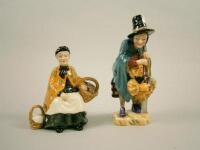 Two Royal Doulton miniature street vendor figures