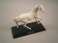 A Beswick figure of a white horse