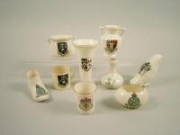 Nine items of crested china