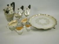 A composite silver plated part fluted tea set