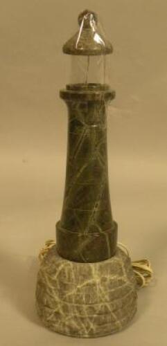 A green Cornish Serpentine lamp base in the form of a lighthouse