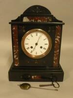 A French black and rouge marble mantel clock