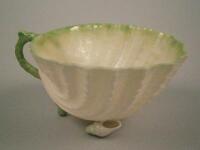 A Belleek porcelain cup