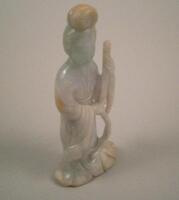 An Oriental green hardstone carving of Guan Yin