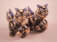 A pair of Chinese polychrome ceramic Dogs of Fo