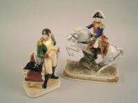 A pair of Continental porcelain military figures