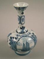 A modern Delft bottle shaped vase