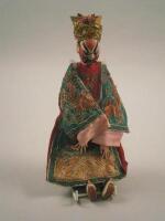 An unusual Eastern costume doll