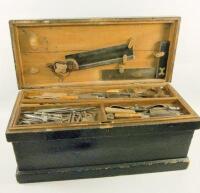 A tool chest containing various woodworking tools etc.