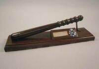 A ceremonial turned and stained beech policeman's truncheon