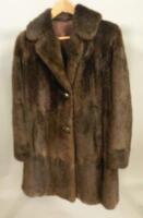 A short mink fur coat.