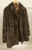 A short brown fur coat.