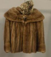 A short fur coat with large collar