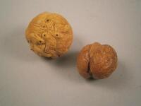 An oriental carved wooden netsuke