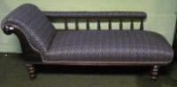 A Victorian walnut chaise longue with blue fan pattern upholstery