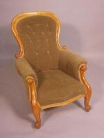 A Victorian satin walnut show frame armchair