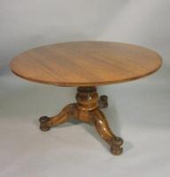 A 19thC walnut tilt top table