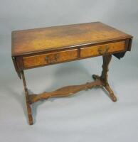 A reproduction burr walnut sofa table