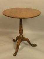 A 19thC oak tilt top occasional table