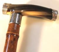 A Victorian horn handled bamboo walking cane