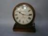 A Victorian rosewood clock by W N Farnham of Lyme Regis