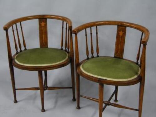 A pair of Edwardian mahogany inlaid tub chairs