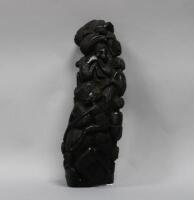 A carved African hardwood group of clambering figures